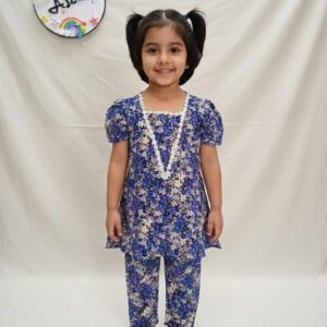 Blue floral cotton A-line kurti with puff sleeves and matching straight pants for girls.