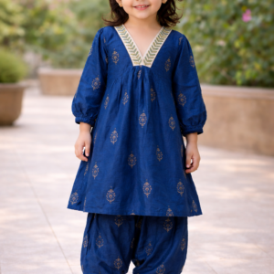 Little girl wearing a midnight blue muslin kurti and dhoti pant ethnic set with golden motifs and embroidered neckline by Ayzal Kids Wear.