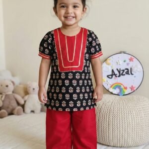 Girls black Ajrakh print cotton kurti with red plazo pants and gota work detailing by Ayzal Kids Wear.