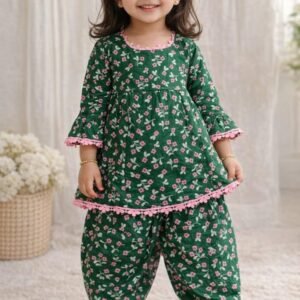 Green floral cotton kurti with matching dhoti pants and pink lace detailing for girls
