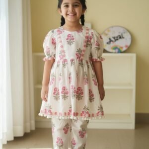 Cream floral cotton peplum top with puff sleeves and matching palazzo pants for baby girls by Ayzal Kids Wear.