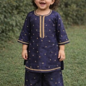grey soft silk girls kurti and palazzo set with golden motifs and lace detailing on neckline, sleeves, hemline, and palazzo border.