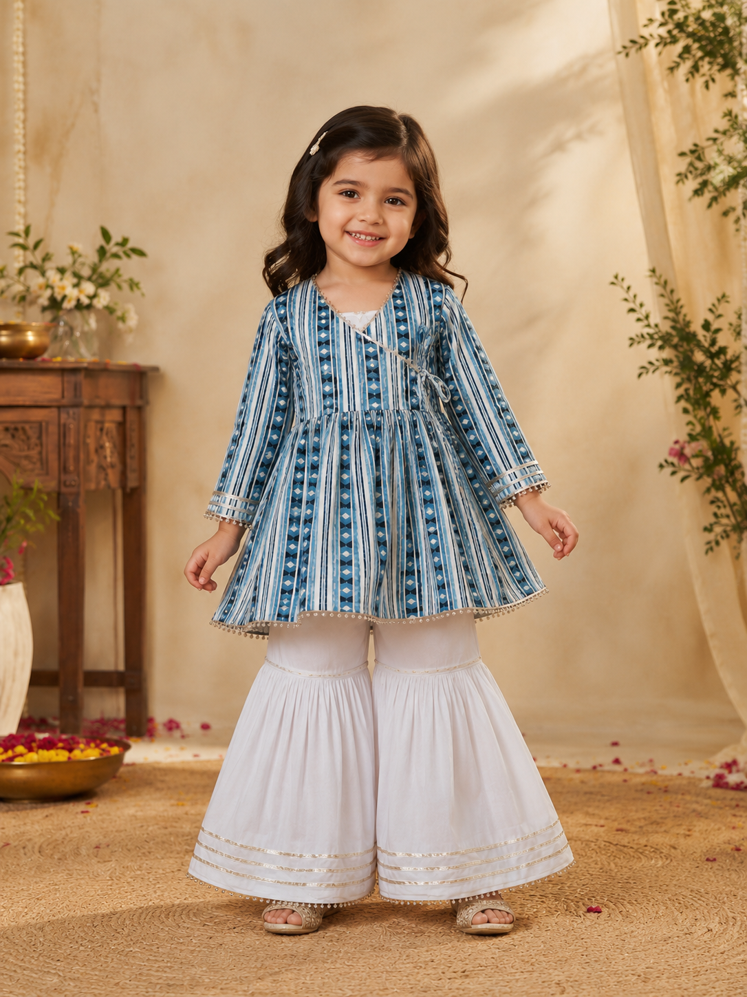Blue striped mul cotton kurti with white sharara pants for girls by Ayzal Kids Wear