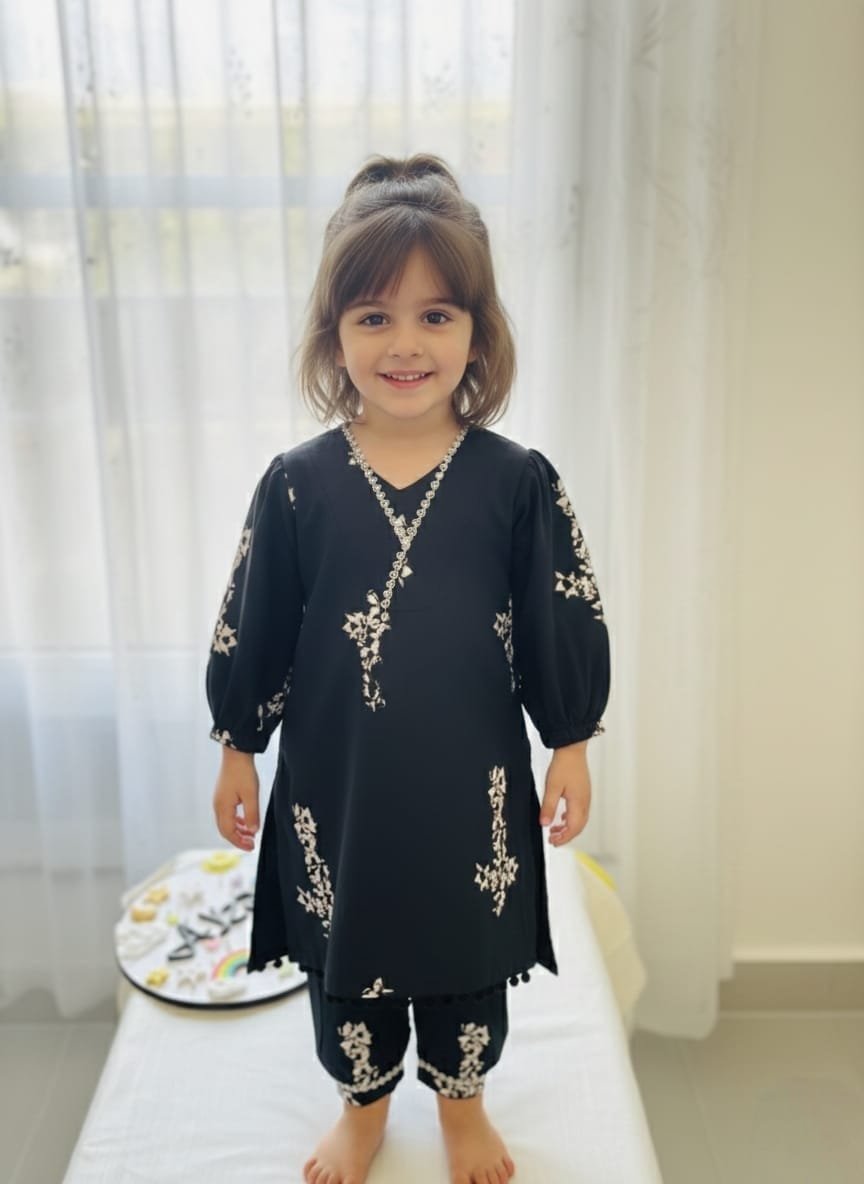 Black floral rayon kurti and pant set for girls with puff sleeves and lace detailing by AYZAL Kids Wear