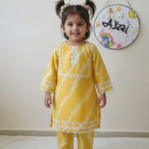 Girls yellow tie and dye mul cotton kurti pant set with lace detailing and cotton lining by Ayzal Kids Wear.